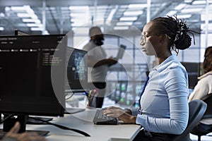 Computer scientist managing and optimizing data center infrastructure