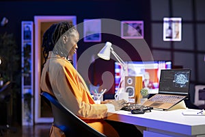 Computer scientist updating artificial intelligence neural networks at home