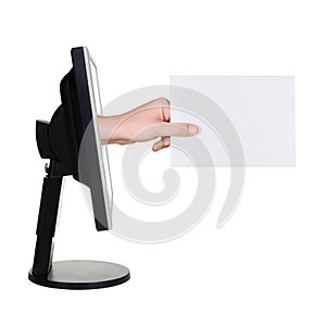 Computer screen and hand with card