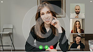 Telecommunications application during a video chat on which team lead is asking