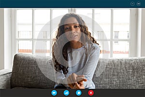 Computer screen view woman looking at webcam talking using videocall