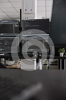 Computer screens showing compiling html code