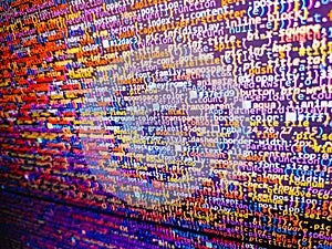 Computer script coding source code on desktop monitor. Lines of Html code visible. Coding programmer abstract background. Computer