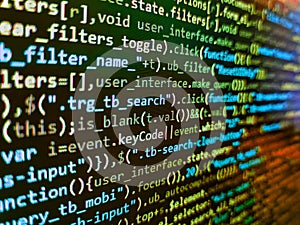 Computer script coding source code on desktop monitor. Writing program code on computer. Code of javascript language on white