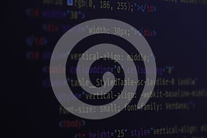 Computer script typing work. Programmer typing new lines of HTML code. Closeup of Java Script, CSS and HTML code. Coding hacker