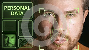 Computer security system scanning man`s face. Personal data related image