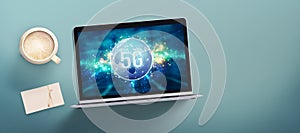 Computer showing a cloud with a world map and message 5G