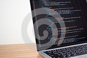 Computer showing software programming code. Developing concepts