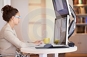 Computer, smart glasses and woman in office for cybersecurity, analytics or research. Pc, monitor and female security