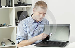 Computer specialist with stethoscope