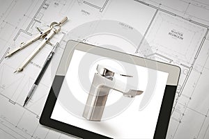 Computer Tablet Showing Custom Faucet On House Plans, Pencil, Compass