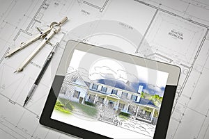 Computer Tablet Showing House Illustration On House Plans, Pencil, Compass