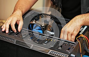 Computer technician installs system of computer.