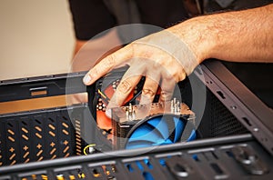 Computer technician installs system of computer.