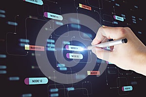 Computer technology concept with hand pushing digital screen with node tree signs