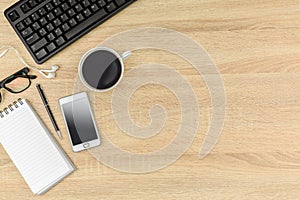 Office desk table with computer keyboard.