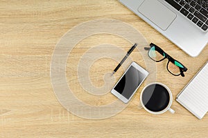Office desk table with computer keyboard.