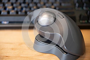 Computer Trackball mouse on office desk at work