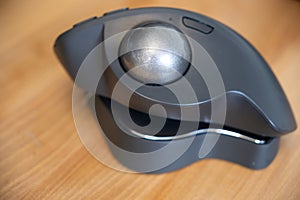 Computer Trackball mouse on office desk at work