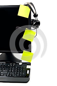 Computer with VOIP headset and sticky notes