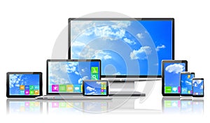 Computers and cloudy sky concept. photo