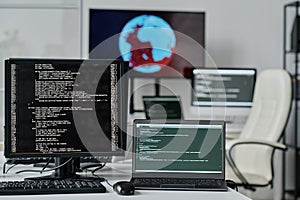 Computers with codes on the screen