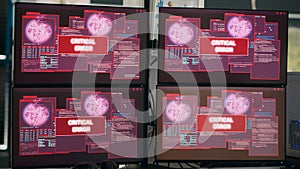 Computers displaying critical error message flashing on screen