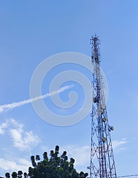 Comunication tower and blue sky photo