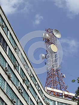 Comunications Tower over a building photo