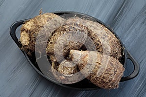 A conatiner with Taro roots or Colocasia or yams