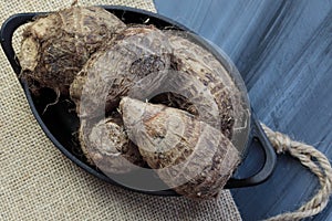 A conatiner with Taro roots or Colocasia or yams