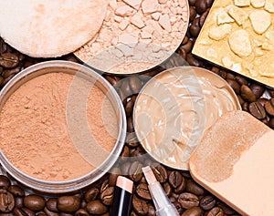 Concealers, foundation, powder on coffee beans