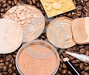 Concealers, foundation, powder on coffee beans