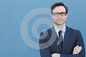 Conceited elegant businessman with arms crossed photo