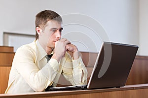 Concentrated businessman with laptop