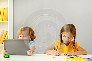 Concentrated preschoolers playing in kindergarten