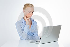 Concentrated woman reads interesting article on website