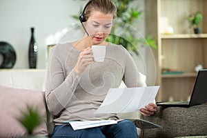 concentrated woman wearing headset with microphone