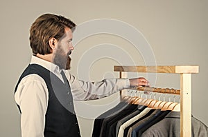 Concentrated on work. male beauty and fashion. bearded man tailoring clothes. formal and office wardrobe. businessman