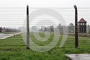 Concentration camp Birkenau with green grass in the rain, Oswiencim Poland