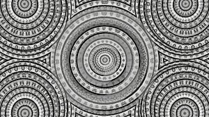 Concentric circular designs with intricate patterns create a mesmerizing