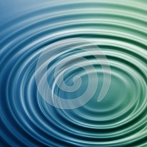 Concentric ripples create a smooth, hypnotic pattern in shades of blue and green. The