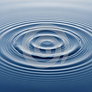 The gentle waves, emphasizing the varying shades of blue, providing a