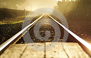 Concept abstract a fresh start ~ railroad tracks at dawn background