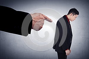 Concept of accused businessman with with fingers pointing