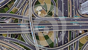 Concept of aerial view from above of traffic on elevated expressway with futuristic autonomous, driverless car, train