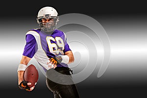 Concept american football, american football player with ball in hand. Black white background, copy space. American