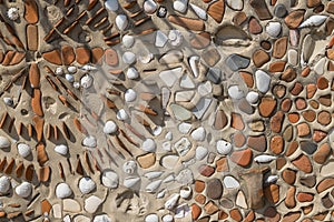 Concept of ancient culture Close up photo of broken colored stones and seashell with mosaic background .Pattern of