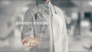 Doctor holding in hand Sjogren`s Syndrome photo