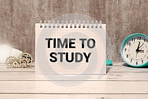 concept back to school, text time to study, two green apples